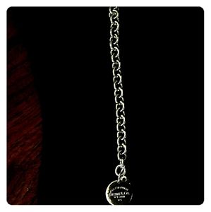 Tiffany 925 sterling silver round return to Tiffan
